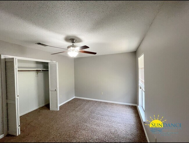 Building Photo - Charming 3-Bedroom Brick Home in Bluewater Bay Community, Caribbean East