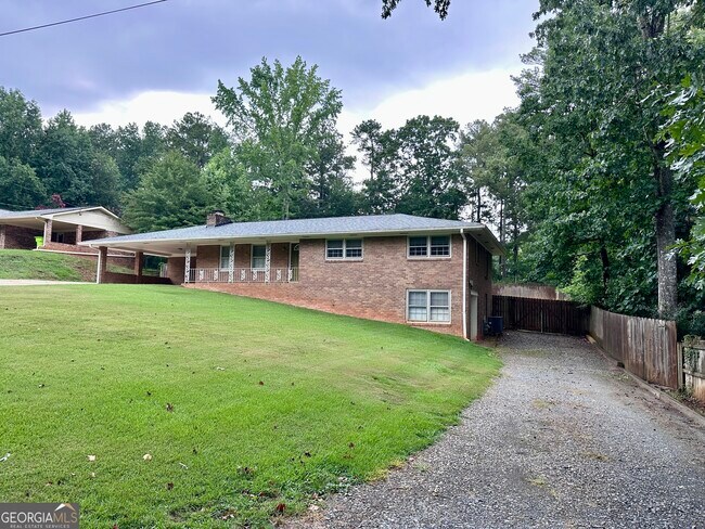 Building Photo - 5506 Woodland Dr
