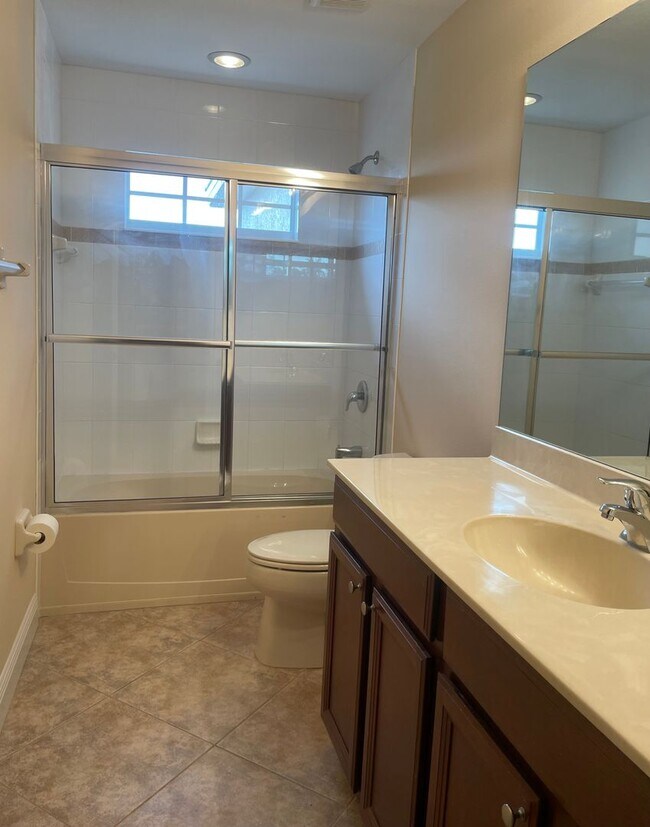 Building Photo - **SUNCOAST LAKES GATED COMMUNITY**