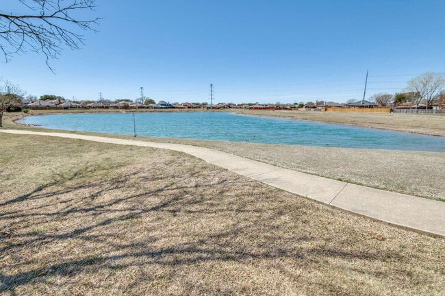 Building Photo - Beautiful 4BD Home with Pond Views & Covered Patio
