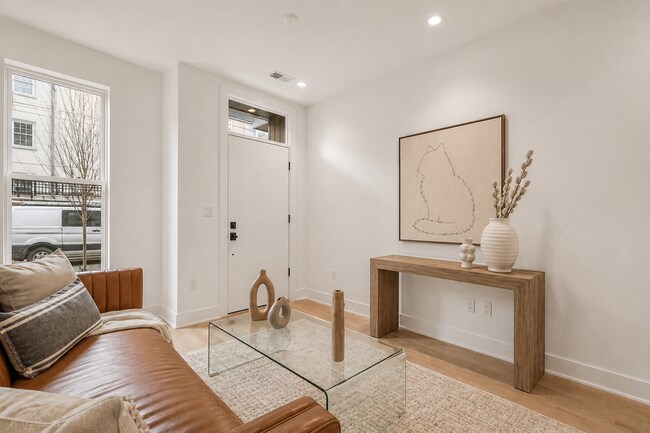 Building Photo - Garage parking, private outdoor space, and skyline views—this Northern Liberties home checks ever...