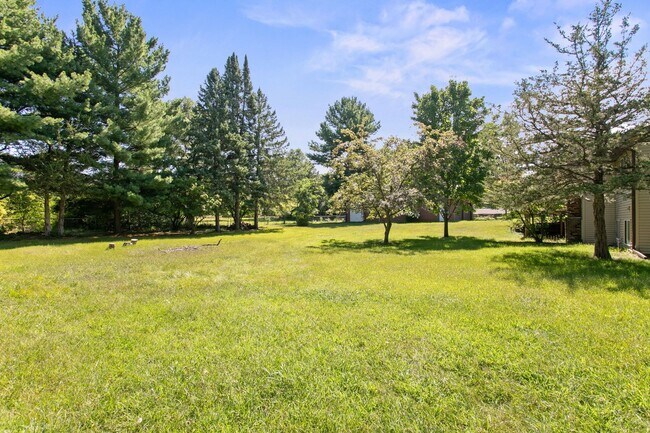 Building Photo - Rent in Andover 4 bd 3 ba 5 garage stalls,...