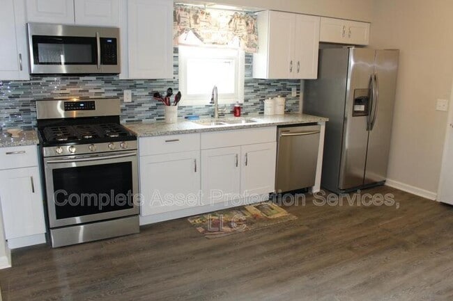Building Photo - 3421 W 77th Pl