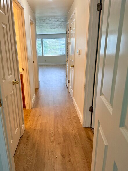 Hallway has two closets and w/d closet - 10734 35th Ave NE