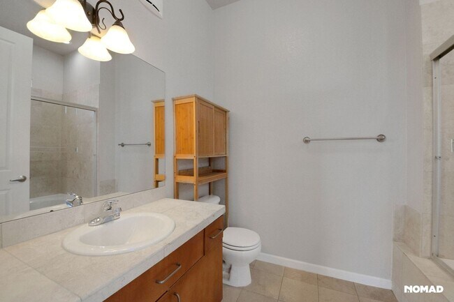 Building Photo - Two each: Bed, Bath, Parking, Storage Unit...