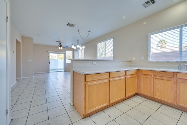 Building Photo - NW!! POOL!!!! GATED!!! Com. Park!!! Low Maintenance desert landscape front Yard. New Carpet!! Ups...