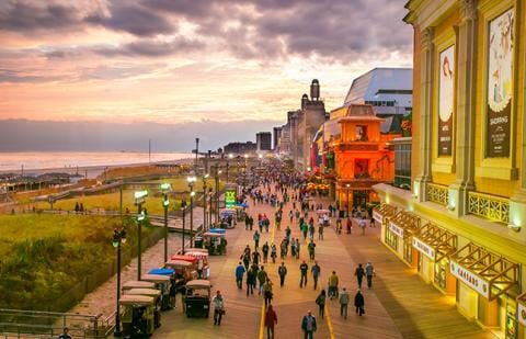 Experience the excitement of the Atlantic City Boardwalk near Garden Court Apartments. - Garden Court
