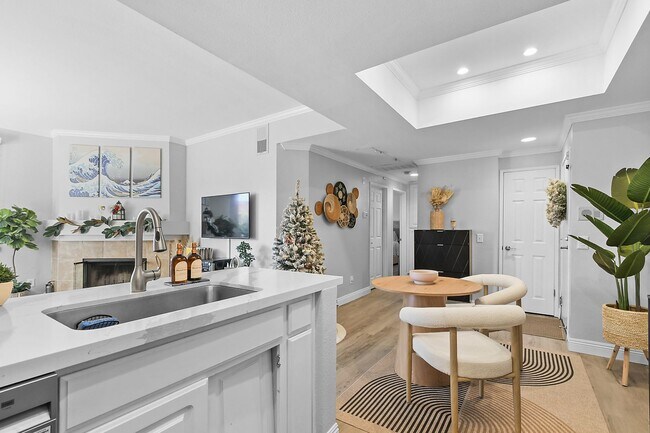 Building Photo - Remodeled River-View Corner Unit with Oversized Patio