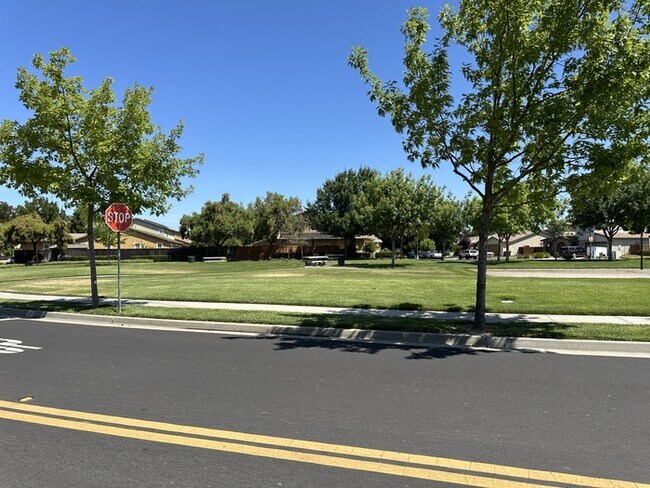 Building Photo - This stunning corner home offers 4 spaciou...