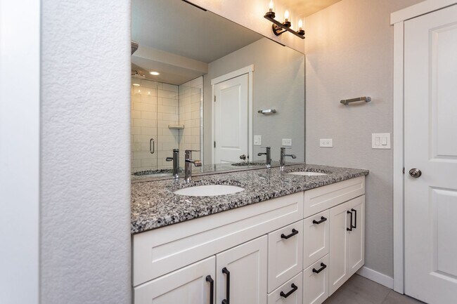 Building Photo - Spacious 5-Bedroom Home with Finished Base...