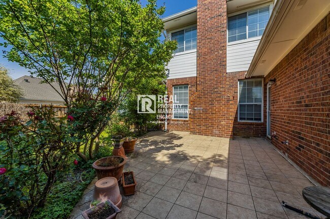 Building Photo - Recently Updated Plano Property with Modern Features and Serene Surroundings
