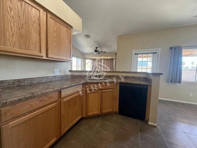 Building Photo - 10720 W Wagon Wheel Dr