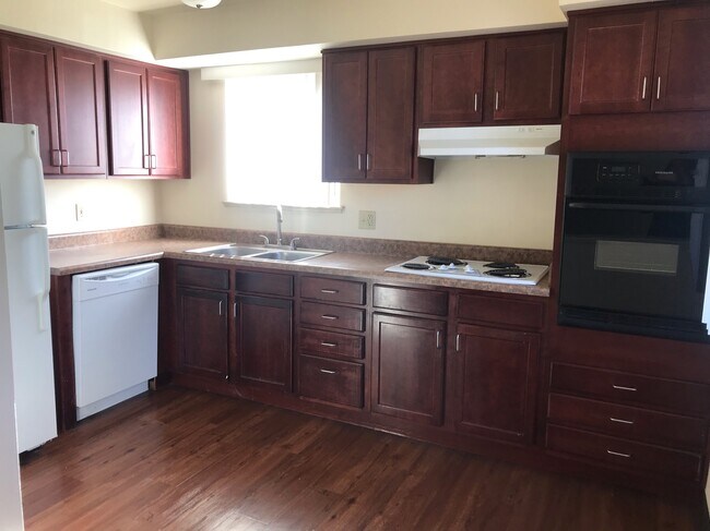 Some units have large open kitchens. - 123 W Powers Cir