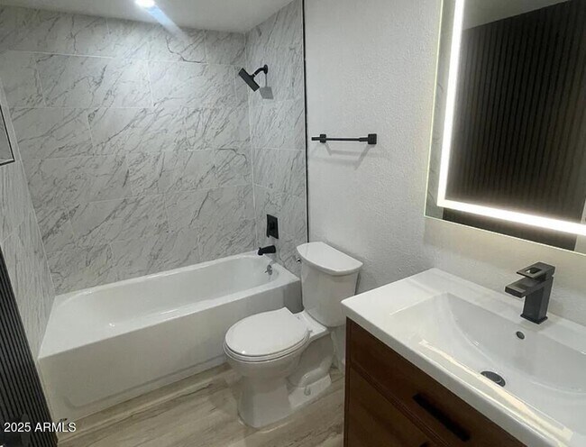 Building Photo - 7870 E Camelback Rd