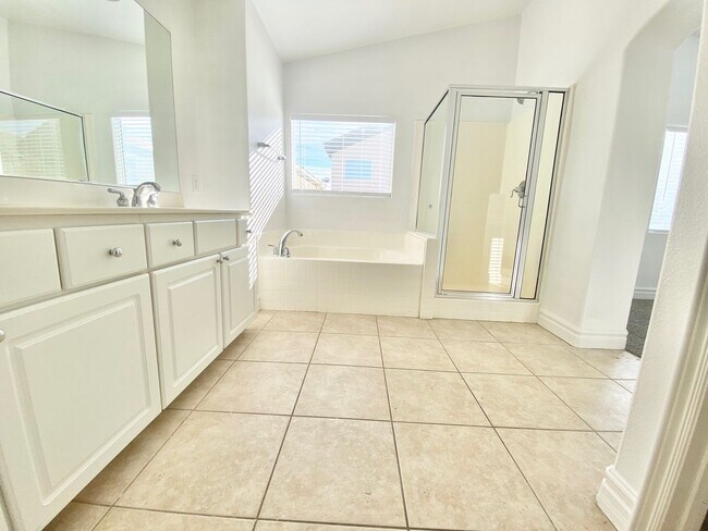 Building Photo - STUNNING 2 STORY HOME IN A GUARD GATED COM...