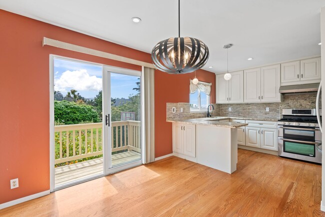 Building Photo - Coastal Charm in Linda Mar - Spacious Home...