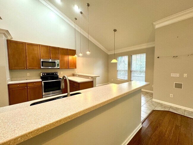 Building Photo - Coastal Charm: Luxurious 4-Bedroom Home in...