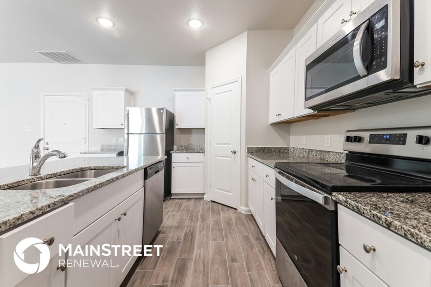 Building Photo - 6310 Tropicana Way