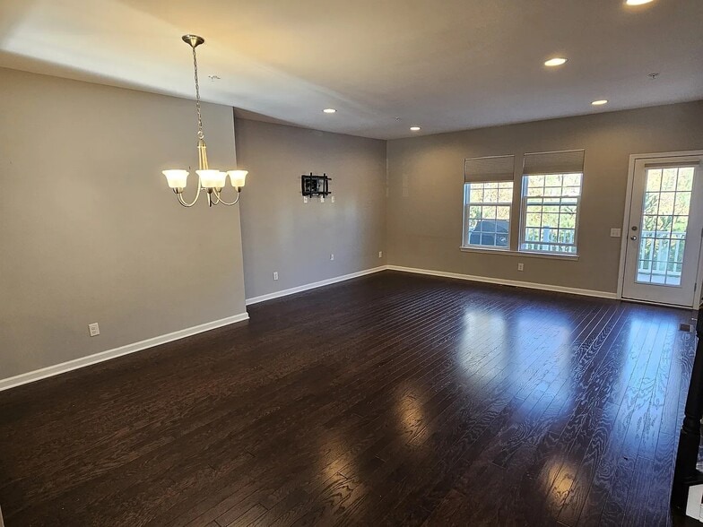 Spacious open-concept main living level offers versatile dining, lounging, and entertaining layouts - 1736 Beacon Ln