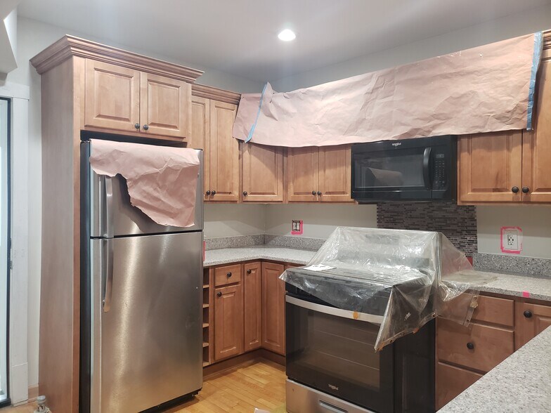 New built in cabinets with stainless steel appliances - 3811 N Central Park Ave
