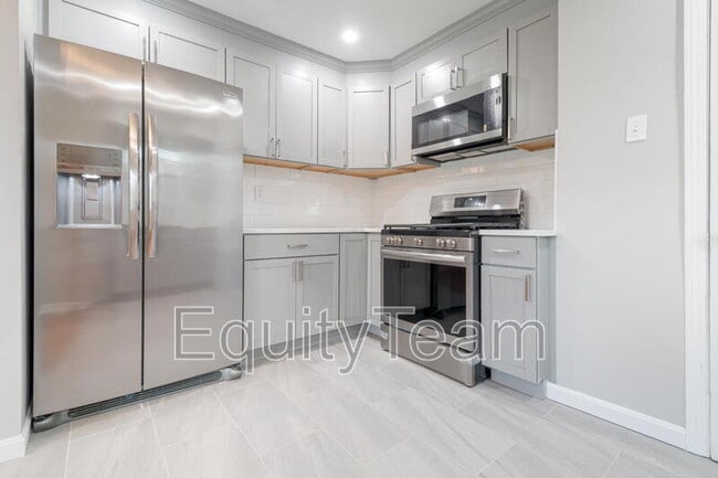 Building Photo - 6819 Elwynne Dr