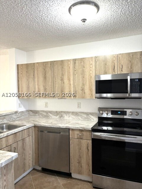 Building Photo - 14367 SW 120th Ct
