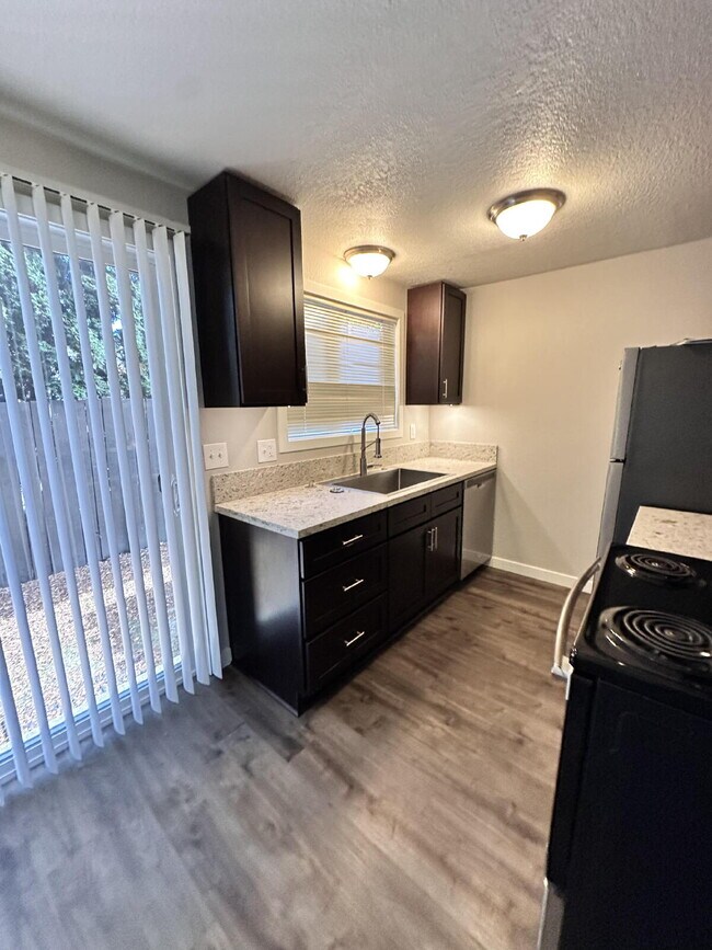 Building Photo - **One Portable AC Unit included**  Recentl...