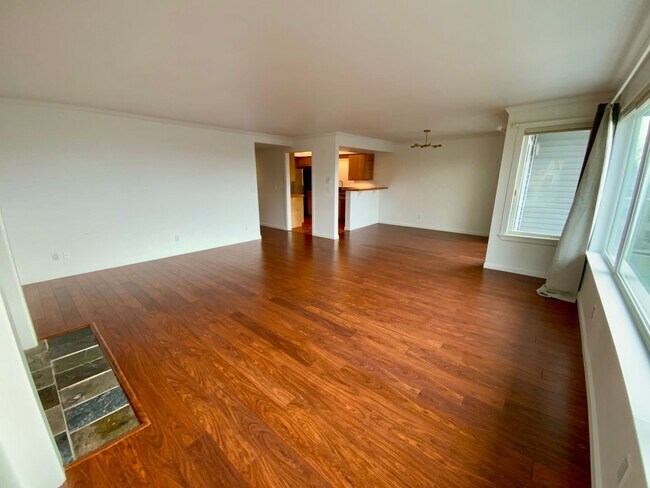 Building Photo - 1,300+ Sq Ft 2BR Condo w/ Parking, W/D & Utilities Included | $1,000 Move-In Credit