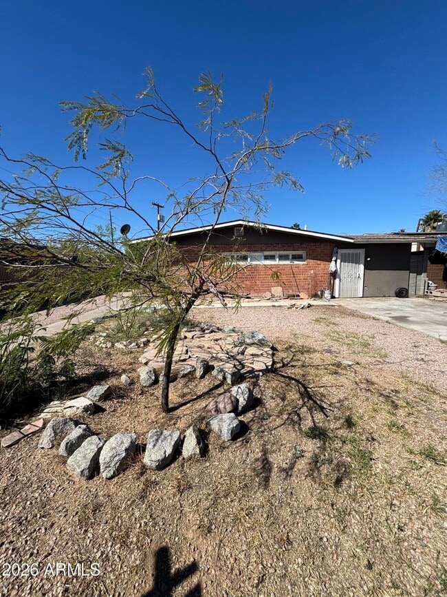 Building Photo - 9406 N 5th Ave