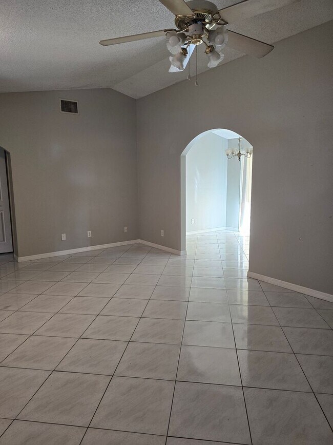 Building Photo - three bedroom 2 bath with garage