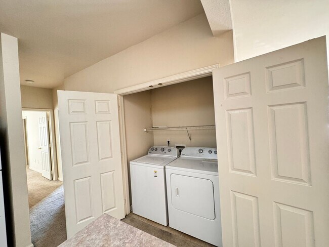 Building Photo - Home Near UNR: Spacious 4BR/4BA with Gated Access and Balcony!