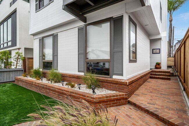 Building Photo - Modern Elegance Meets Ocean Breezes – Full Lot Sand Section Stunner