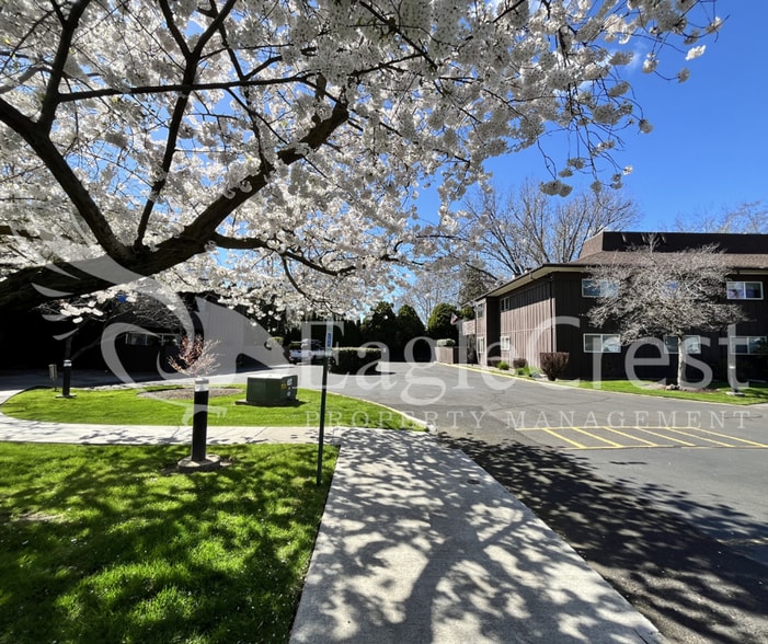 Building Photo - Convenient 2 Bedroom 2 Bathroom Condo Living "In The Trees" with On-Site Amenities