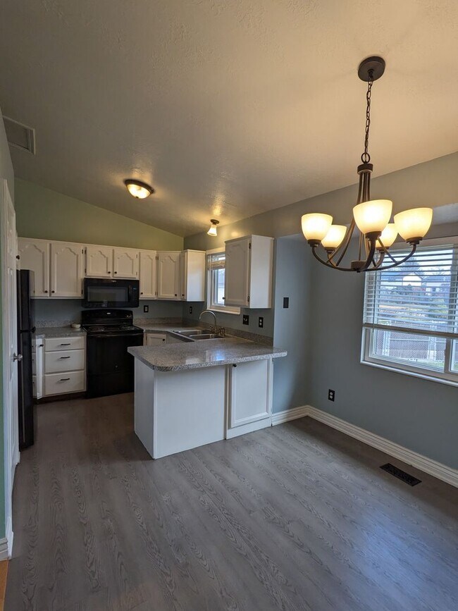 Building Photo - $1,800 Rent Credit! Spacious 5-Bed Clearfield Home with Garage & Fenced Yard