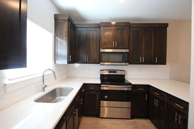Building Photo - Coming Soon! 2 Bedroom 2.5 Bath Townhome a...