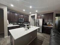 Building Photo - Clean and well maintained 4 bedroom home f...