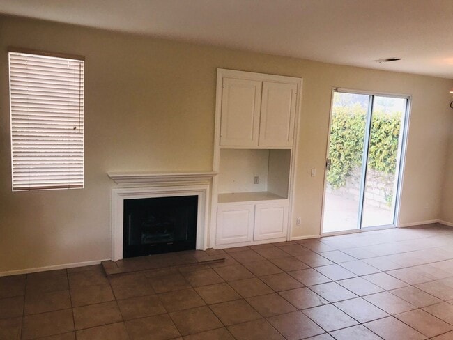 Building Photo - Located on a cul-de-sac, within the gated ...