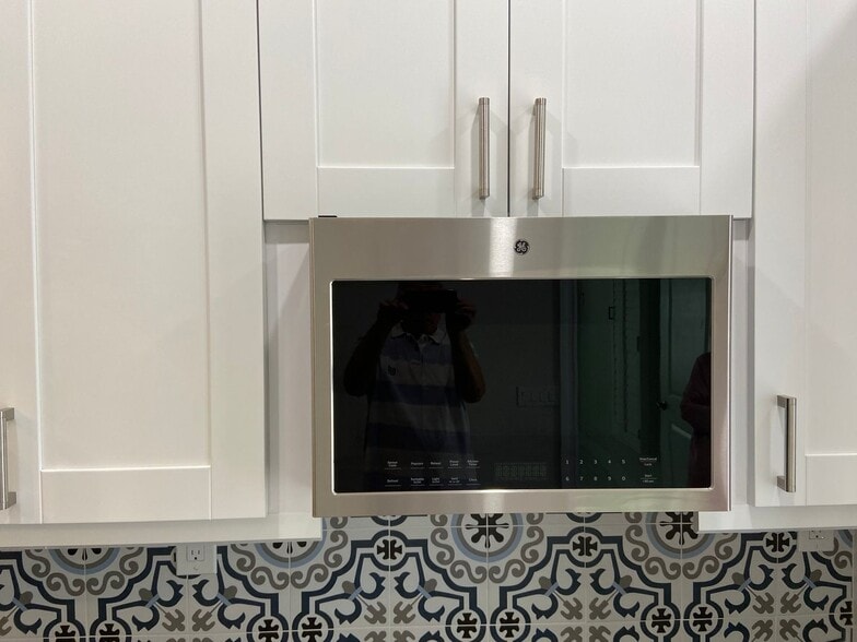 Building Photo - 3677 37th Ave NE