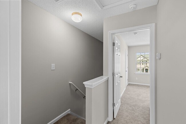 Building Photo - Charming 2-Bedroom 2.5-Bathroom Townhouse with Fenced Yard