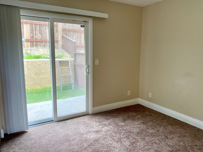 Building Photo - AFFORDABLE 1st Floor Condo & patio yard!