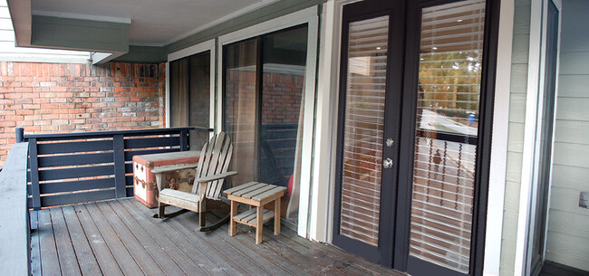 Living Room balcony - a circular staircase leads to private patio - 8710 Park Ln