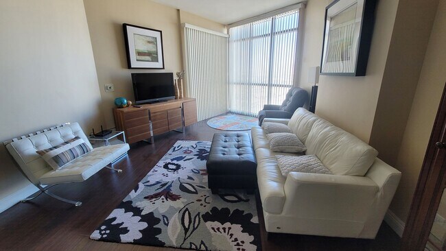 Building Photo - ***GORGEOUS FURNISHED 1 BEDROOM CONDO AT A...