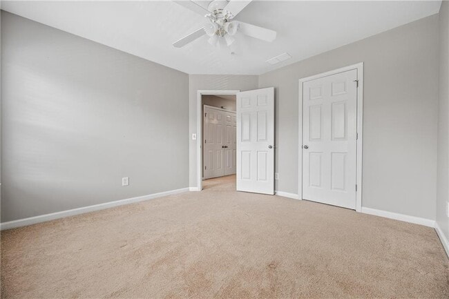 Building Photo - 4721 Creekside Villas Way
