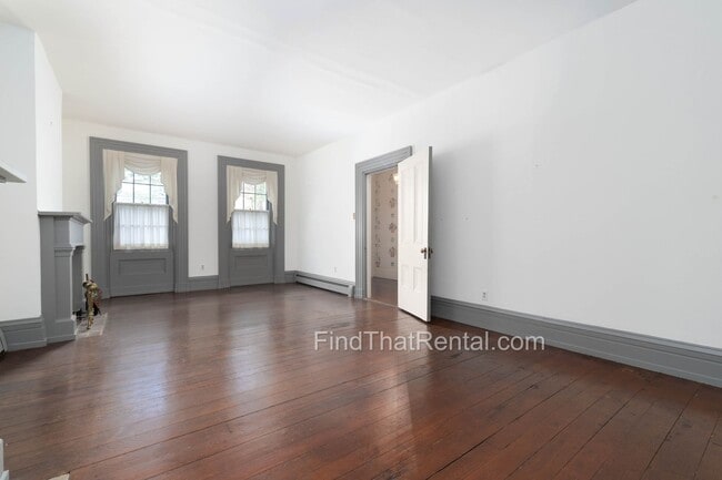 Building Photo - AVAILABLE NOW! Restored historic downtown Carlisle rental with fenced yard, pond, balcony, and ha...