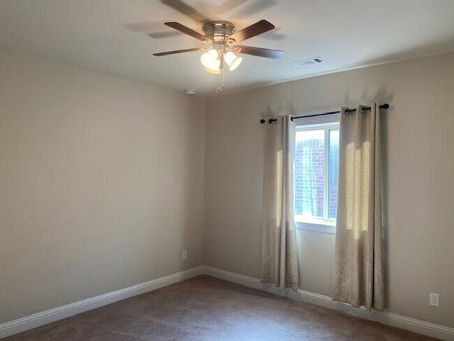 Building Photo - Breathtaking 4-bedroom home in the highly ...