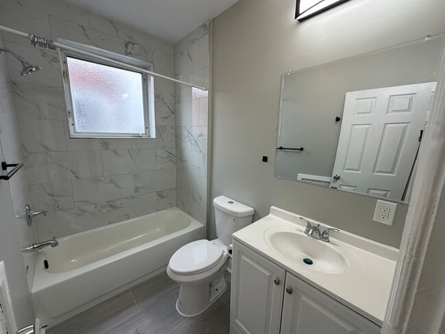 Building Photo - Experience comfort in three large, light-f...