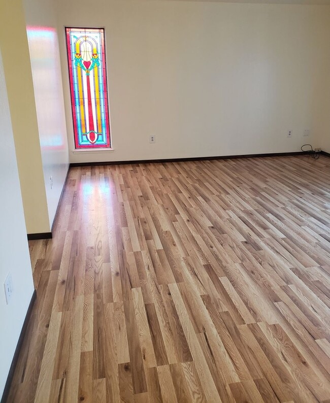 Building Photo - Bright Upstairs Studio with Deck & Peek of the Ocean | Utilities Included