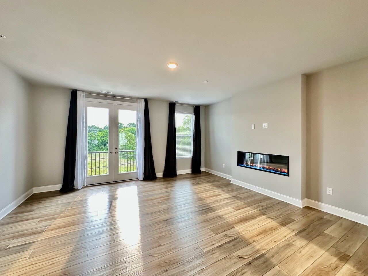 Living Room with Juliette Balcony - 1253 S Blount St
