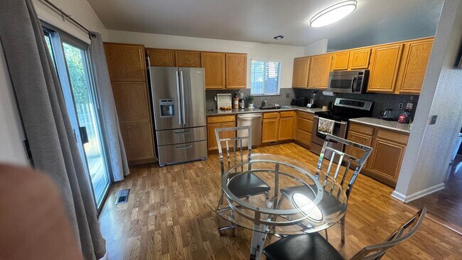 Building Photo - 4bed/2bath/2car garage. RV parking & massive landscaped backyard in cut-de-sac