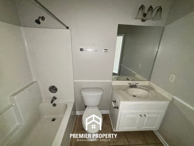 Building Photo - Charming 3BR Tuscaloosa Home | Hardwood Floors, Brick Fireplace, 2-Car Garage & Fenced Yard